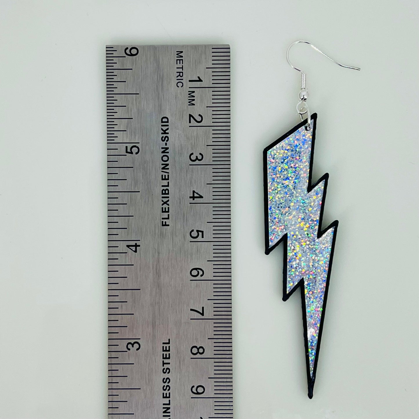 Holographic lightning bolt novelty statement earrings