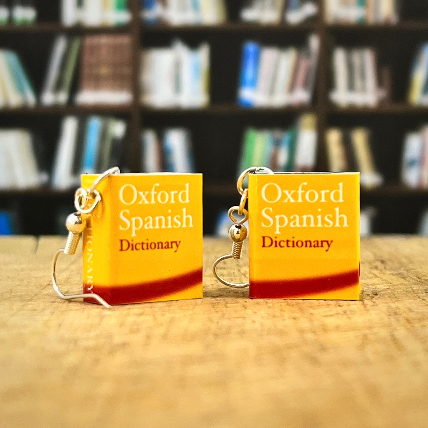 Miniature Spanish dictionary earrings