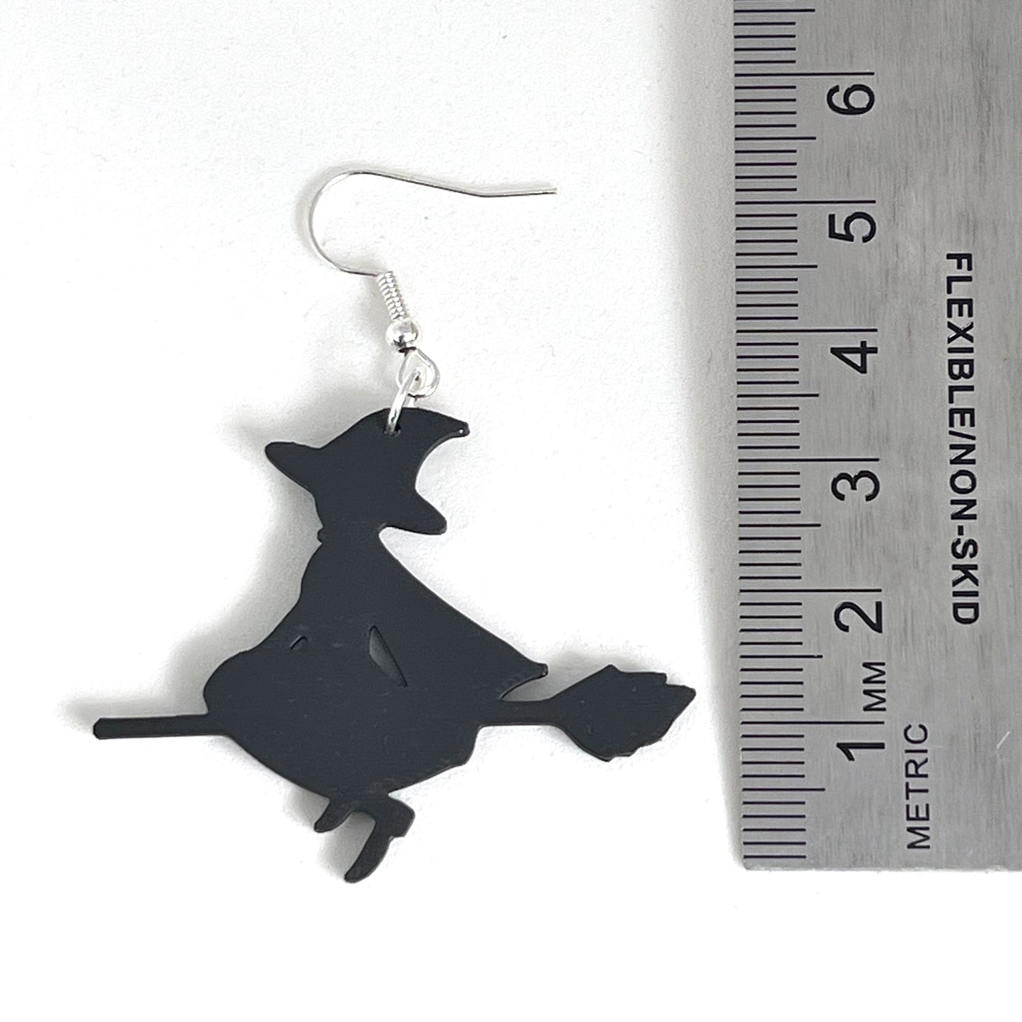 Flying witch silhouette dangle earrings