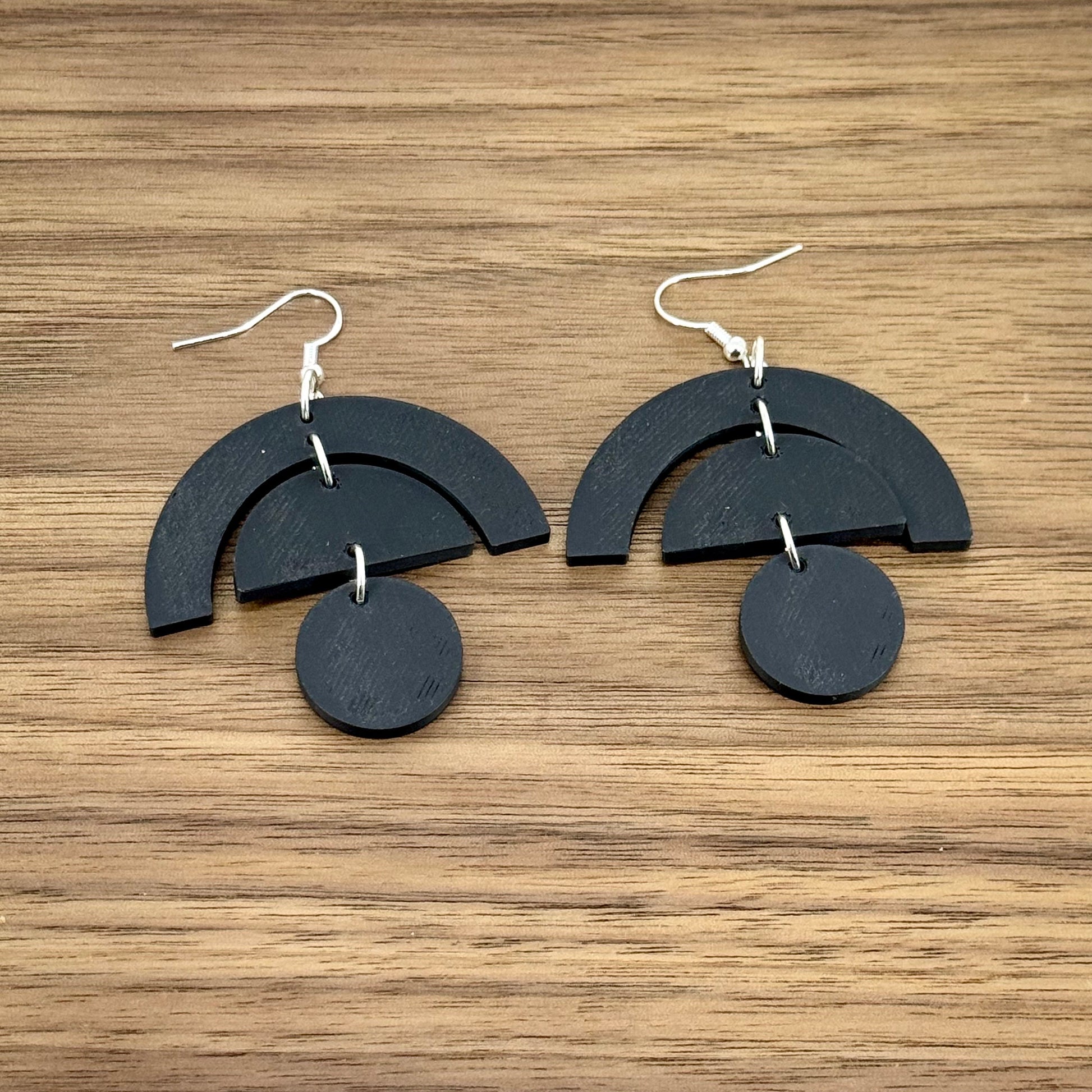 Black mid-century design dangle earrings