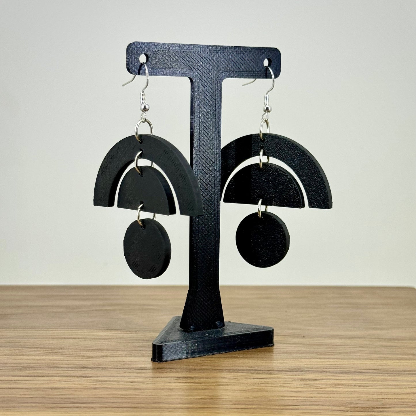 Black mid-century design dangle earrings